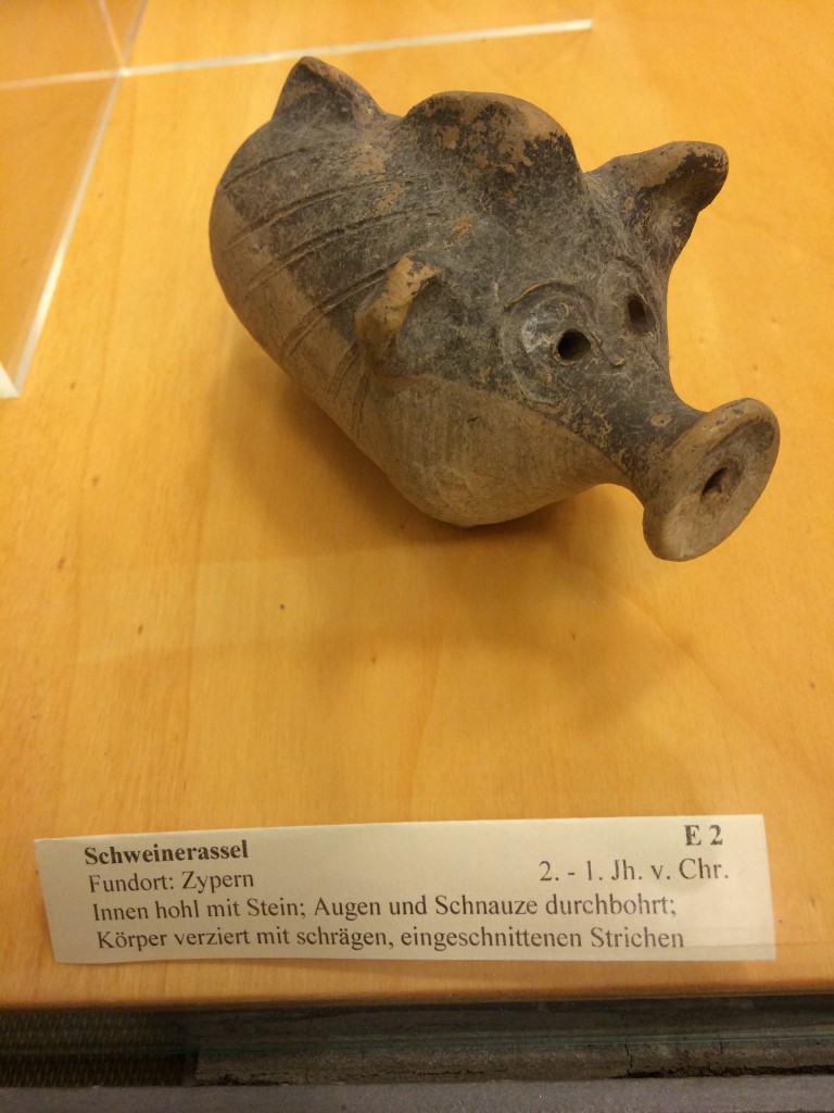 Teach yourself German! "Schweinerassel," a ceramic bottle in the shape of a pig. 2nd century!